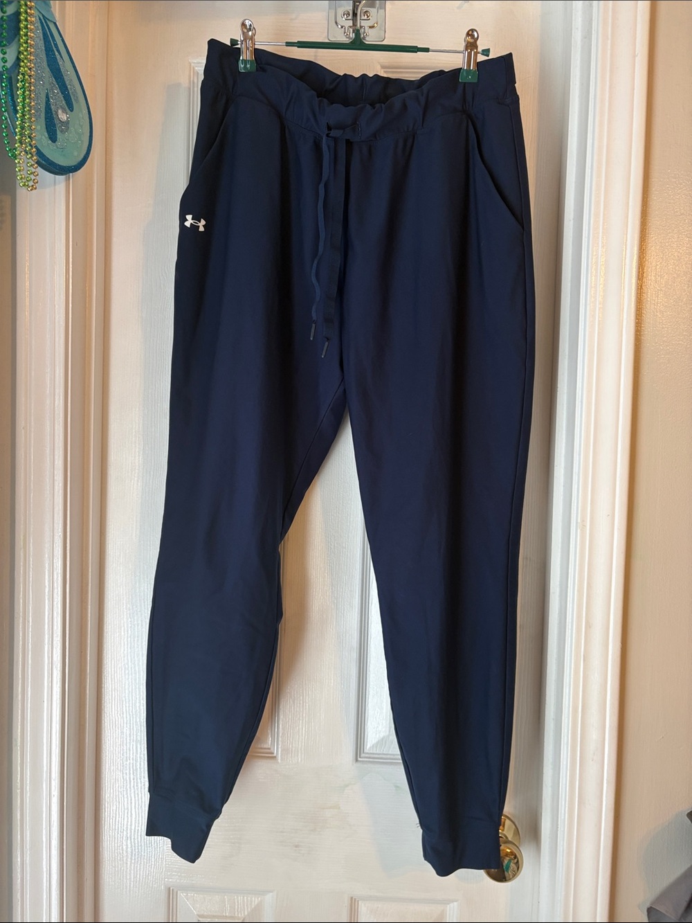 Under Armour women’s mid rise navy joggers size medium.